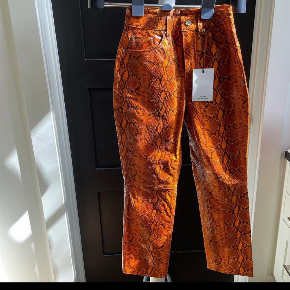 GRLFRND leather snakeskin-print straight pants.